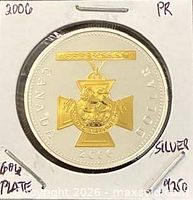 Reverse of 2006 proof silver dollar showing gold-plated Victoria Cross design