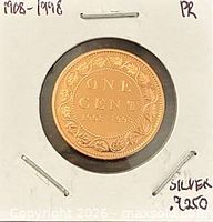 Reverse showing ONE CENT 1908-1998 legend in holder