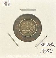 Reverse side showing wreath, crown, date 1918 and denomination 5 CENTS CANADA, in cardboard flip