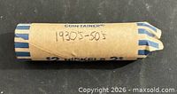 Full view of wrapped coin roll with handwritten 1930s-50s marking