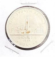 Reverse side showing Parliament Buildings, legends and date