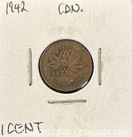 Reverse side of the 1942 Canadian 1 cent coin showing maple leaves and date