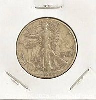 Obverse of 1942 Walking Liberty Half Dollar in cardboard flip