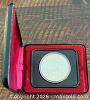 Coin in presentation case