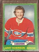 Front of Larry Robinson O-Pee-Chee hockey card with green border
