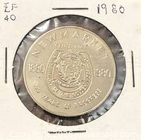 Obverse of 1980 Newmarket Ontario centennial trade dollar in holder