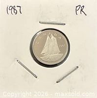 Reverse of 1987 Canadian proof dime in flip