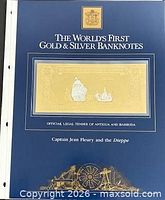 Presentation folder cover titled The World’s First Gold & Silver Banknotes