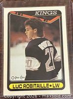 Front of 1990-91 O-Pee-Chee Luc Robitaille hockey card #209