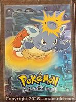 Front of Wartortle card showing artwork and logo