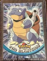 Front of the Blastoise card showing character art and card number