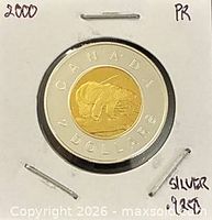 Reverse side showing polar bear and CANADA 2 DOLLARS legend