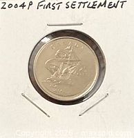 Reverse side of 2004P Canadian commemorative quarter in cardboard holder