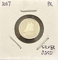 Reverse Bluenose design visible in 2x2 holder