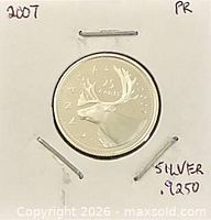 Reverse view showing caribou design, year 2007 and silver proof quality