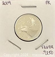 Reverse of 2009 Canadian 25-cent proof coin showing caribou, in 2×2 holder