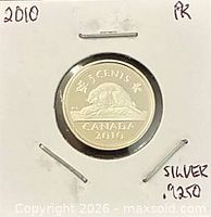 Reverse side showing beaver design, denomination and year