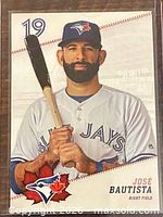 Front of José Bautista trading card shows player image card number 19