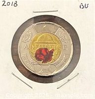 Reverse of 2018 colour Armistice $2 coin in holder