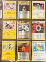 Front view of all nine cards in binder page