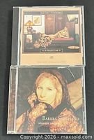 Front covers of both Barbra Streisand CDs