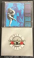 Front covers of both Guns N' Roses CDs