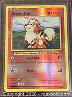 Front of Growlithe reverse holo card showing foil finish, stats and attacks