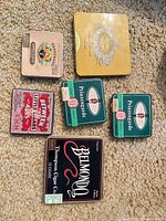 Group shot of all six cigar tins