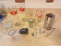 Group shot showing all glasses, mixer, spoon and stopper box