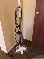 Full view of Bissell SpinWave upright floor washer with cord