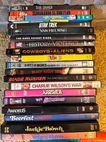 Stack of DVD spines showing nineteen titles