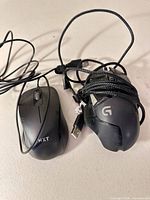 Front view showing both mice side by side with USB cables