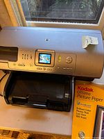 HP Photosmart 8450 printer with Kodak Ultima Picture Paper pack visible