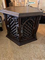 Full view of hexagonal drum end table closed