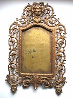 Full view of ornate bronze frame front
