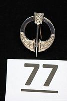 Front view showing full brooch design and condition