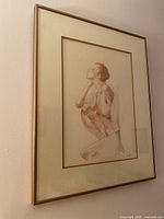 Full view of framed artwork on wall