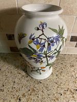 Full view of Portmeirion Botanic Garden vase front with botanical and butterfly design
