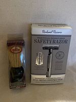 Rockwell 2C razor box and Omega brush in packaging