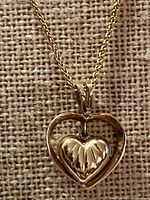 Front view showing pendant and rope chain