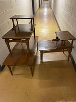 Front angled view showing coffee table and both tiered side tables together