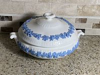 Covered dish showing full exterior with lid and handles