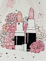 Front view of canvas print featuring two lipsticks and pink flowers