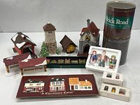 Group shot of all Department 56 buildings, signs, brick road tubes, figures, ornaments and pins
