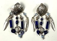 Full view of both earrings showing overall design and materials