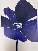 Close view of blue flower design on canvas