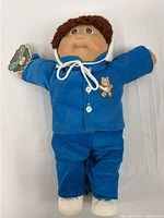 Full view of 17" Cabbage Patch Kid doll in blue corduroy outfit