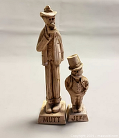 Two antique figurines Mutt and Jeff front view
