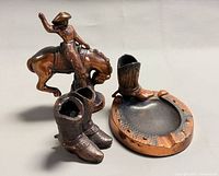 All three copper western décor items grouped