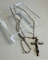 Pendant and full chain on display stand